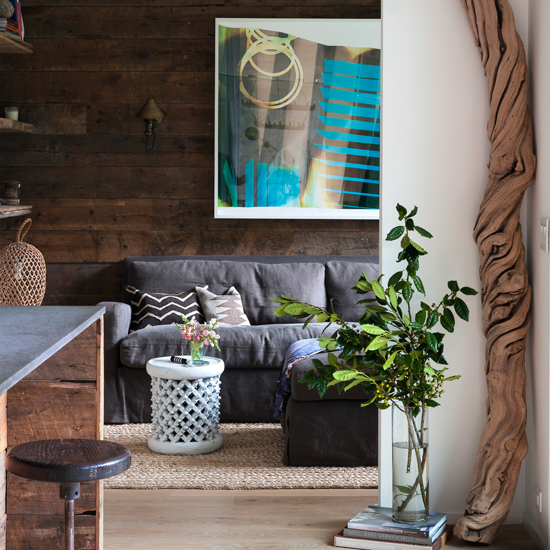 Grey living room with wood cladding