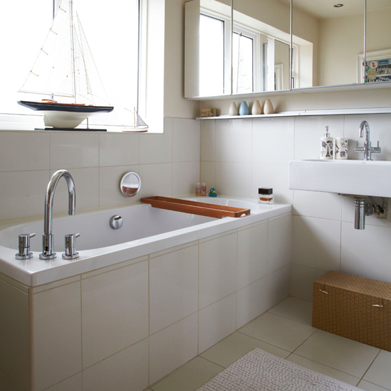 Modern white tiled bathroom