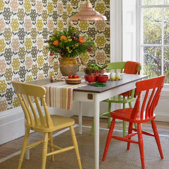 Dining room with retro print wallpaper