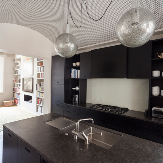 Modern kitchen with dark cabinetry
