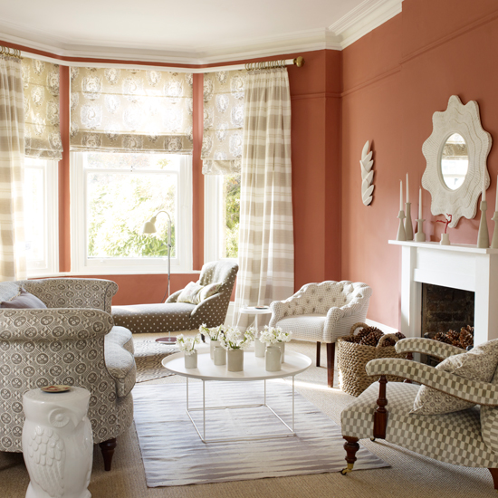 Terracotta living room with patterned fabric