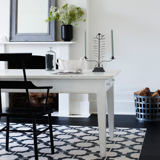 Monochrome dining room with bold flooring