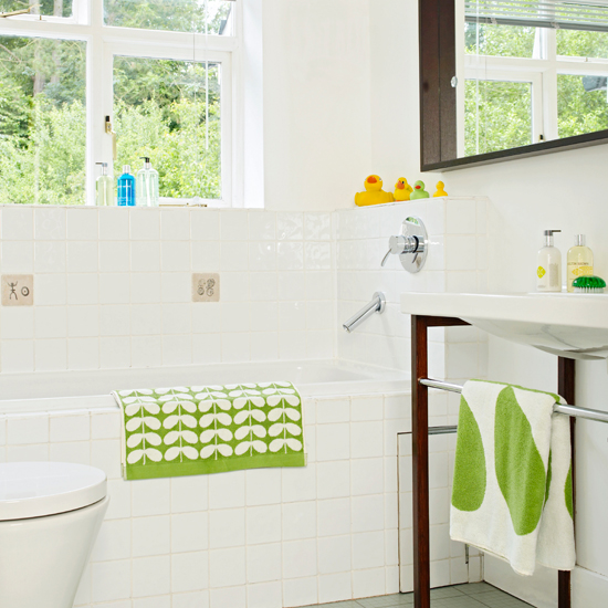 White bathroom with green accents