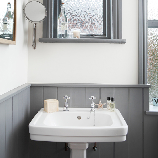White and grey bathroom with traditional basin