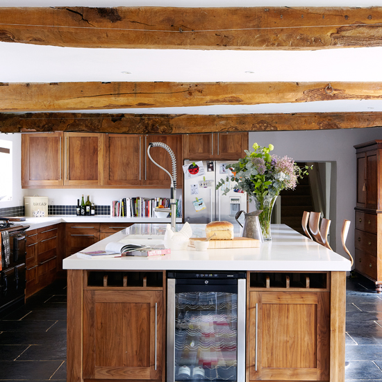 Walnut kitchen with wooden beams
