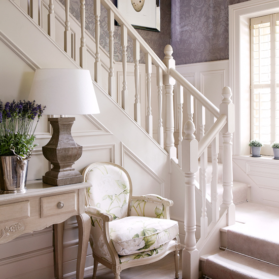 White hallway with damask wallpaper