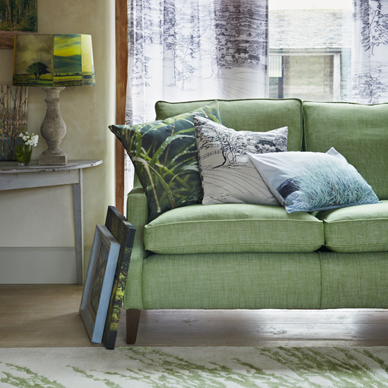 Green living room with oak flooring 