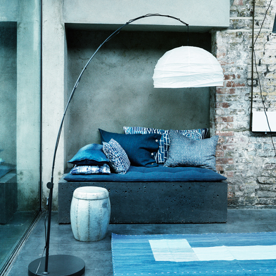 Modern Blue And White Living Room With Exposed Brick And Concrete