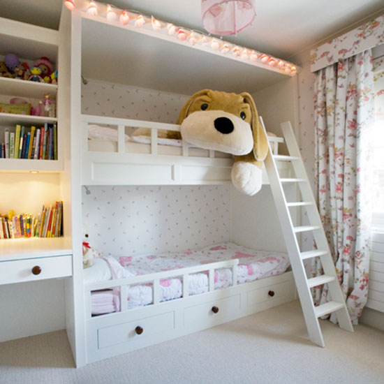 Girls' room bunk beds with large soft toy 