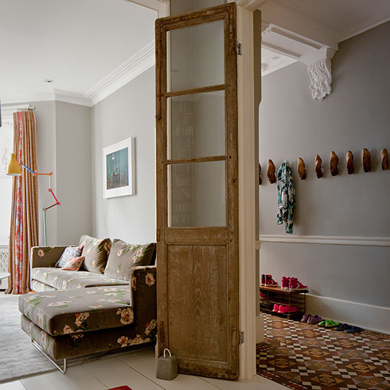 Pale grey hallway with wooden door | Hallway decorating | Livingetc 