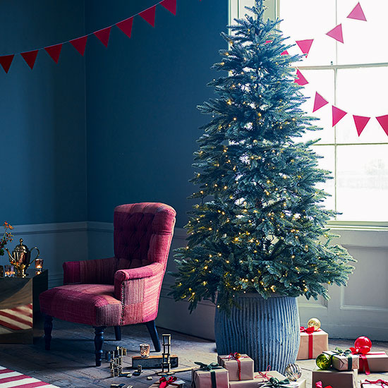 Blue Christmas living room with red armchair 