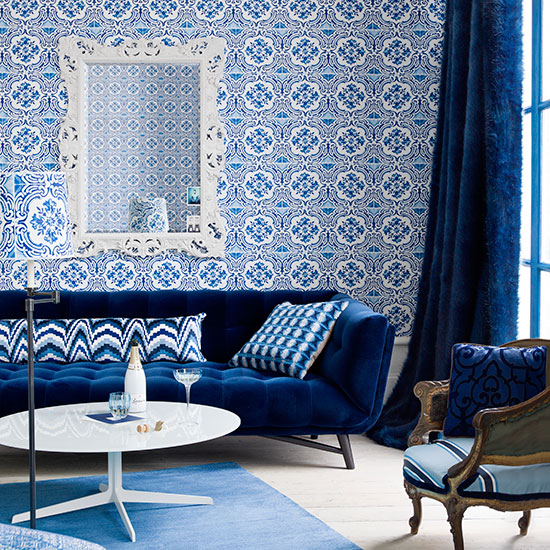 Royal blue living room with feature wall