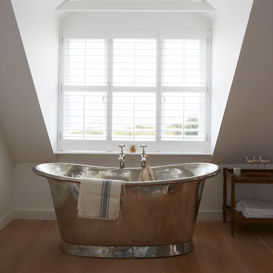 White bathroom with metallic bateau bath | West Sussex country house | House tour | PHOTO GALLERY | Country Homes and Interiors | Housetohome.co.uk