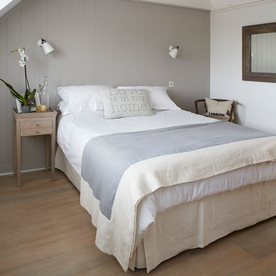 Pale grey guest bedroom with statement cushion | West Sussex country house | House tour | PHOTO GALLERY | Country Homes and Interiors | Housetohome.co.uk