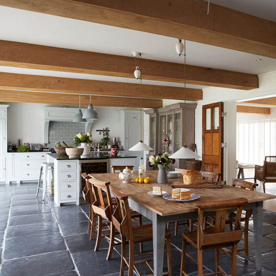 Farmhouse-style kitchen diner with large wooden dining table | West Sussex country house | House tour | PHOTO GALLERY | Country Homes and Interiors | Housetohome.co.uk