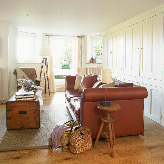 Swedish-style living room with cupboards and sofa | housetohome.co.uk