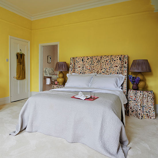 Boutique bedroom in primrose yellow | Guest bedroom design ...