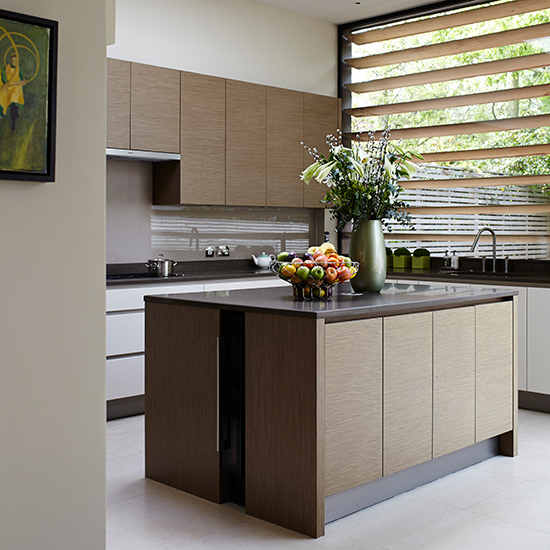 Contemporary kitchen with neat wooden units and wooden ...